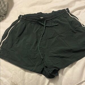 Lululemon Athletica Forest Green Athletic Shorts with pockets